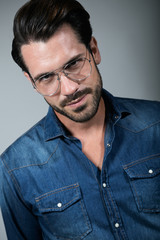 Obraz premium Elegant young handsome man. Studio fashion portrait.