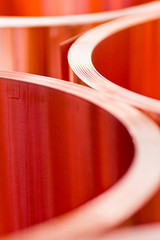 closeup of copper sheet in rolls from the selected focus