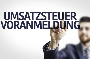 Business man pointing: Umsatzsteuer Voranmeldung (German Tax)