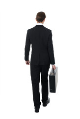 Rear View Of Businessman Carrying Briefcase