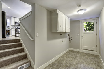 Empty hallway with exit to backyard area