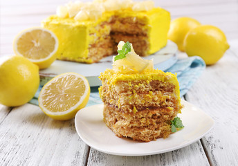 Tasty lemon dessert on wooden table