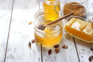 Fresh honey on wooden table