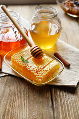Fresh honey on wooden table