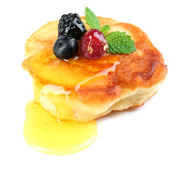 Tasty pancake with fresh berries and mint leaf, isolated