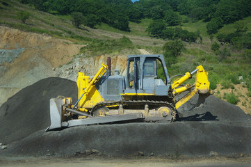 big yellow bulldozer at work-site