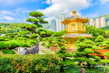 Gold Chinese pavilion at the park of Hong Kong