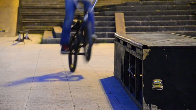 bicycle driver slide on edge of ledge box