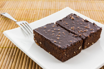 Brownie cake on white background.