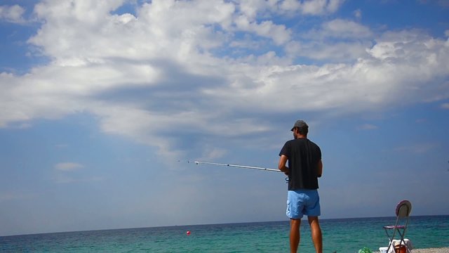 Fisherman fishing in the sea