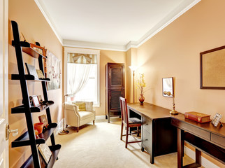 Beige office interior with desk