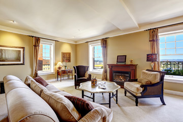 Apartment interior with fireplace and antique style furniture
