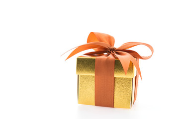 Gold gift box isolated on white background