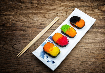 colorful Sushi set on wooden background