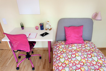 Girl's room with white desk