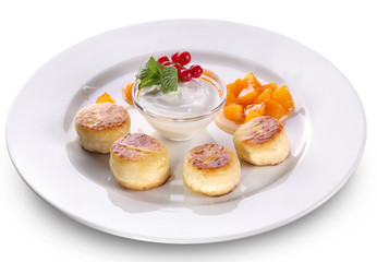 Cheese cakes on a white plate.