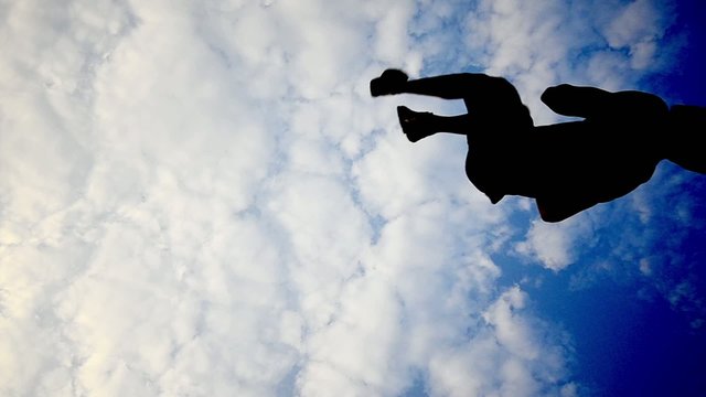 Five parkour backlit silhouette