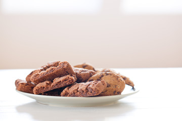 chocolate cookies on white table