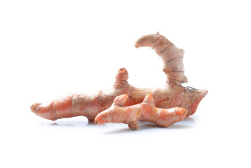 Turmeric root on white background