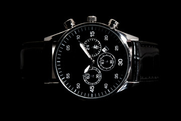 modern watch isolated on a black background