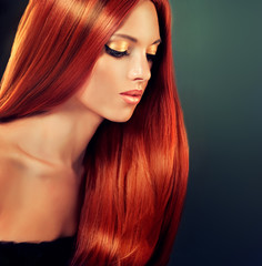Beautiful model with long red hair