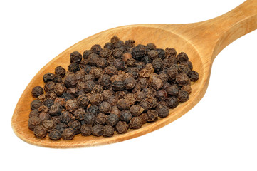 Black Peppercorns And Wooden Spoon