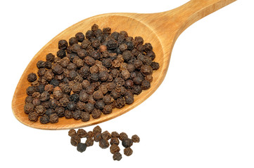 Black Peppercorns And Wooden Spoon