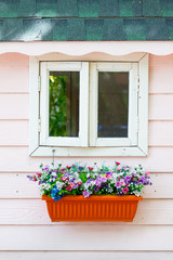 Fototapeta na wymiar Window and bouquet of flower