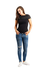 Fototapeta premium Standing beauty with hands in pockets