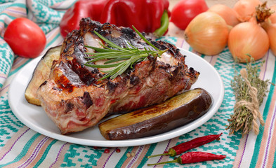 Ribs Grill on a plate with vegetables.