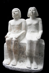 Sitting group statue of a married couple from Egypt