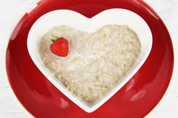 Healthy breakfast  of strawberry porridge / oatmeal.