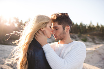 couple in love on the beach in autumn