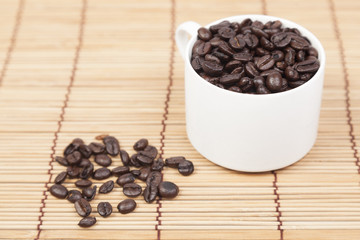Coffee cup and coffee beans