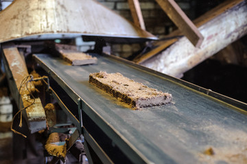 pressed peat blocks at the factory