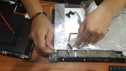 Montaje y reparación de Flex en portátil.