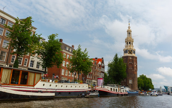 Amsterdam canal Oudeschans and tower Montelbaanstoren, Holland,