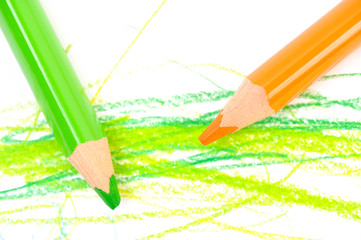 Green and orange pencils