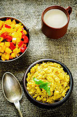 red lentils with curry and dates and a salad of mango and tomato