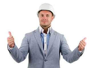 Man wearing a hardhat cheering in jubilation