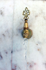 Old decorative metal tap