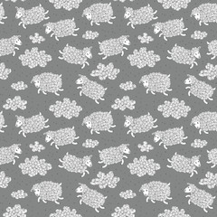 Naklejka premium Seamless pattern with cute sheep and clouds.