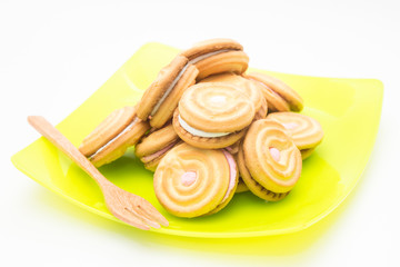 cookies on green disk with wood fork