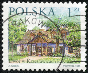stamp printed in Polska shows polish farmhouses