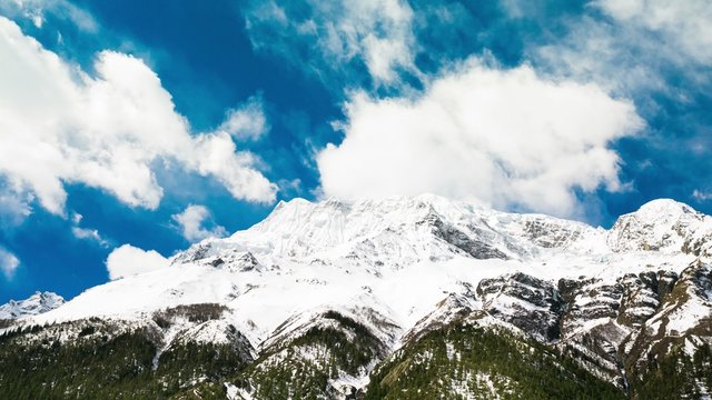 4k Timelapse of Annapurna III mountain, 7,555 m (24,786 ft). Nepal, Himalayas. Annapurna III is a part of Annapurna circuit trek, one of the most popular adventure circuit trek in the world.