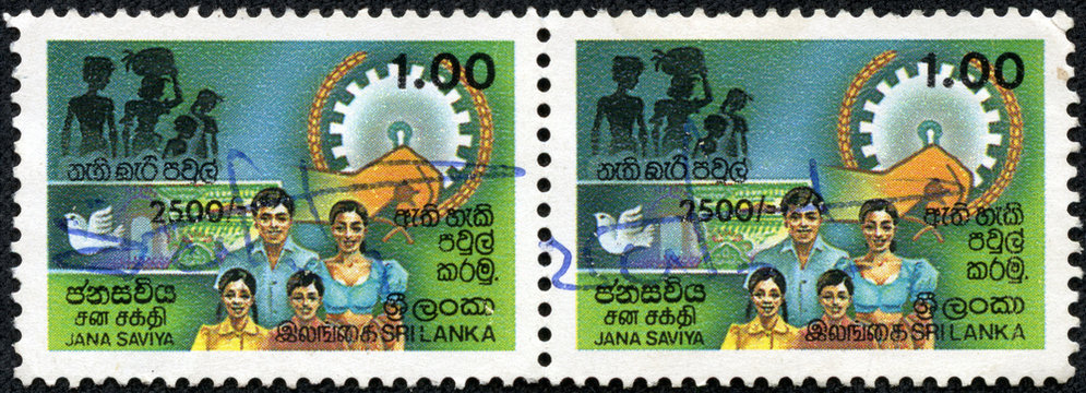 stamp printed in the Ceylon shows image of a family members