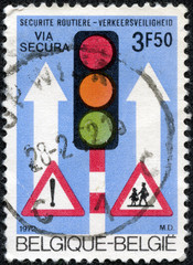 Stamp shows a traffic signs and a traffic light