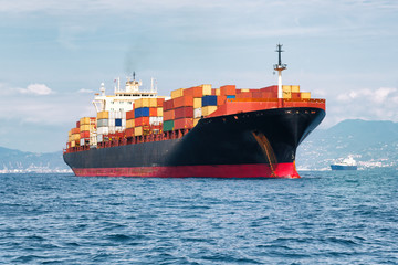commercial cargo ship carrying containers