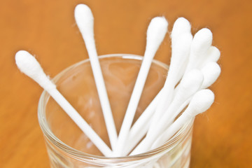 cotton bud on wood background