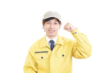 ガッツポーズの笑顔の男性